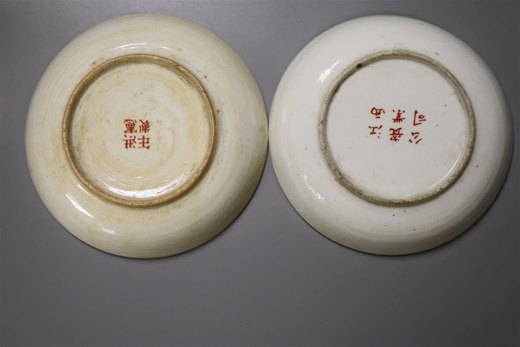A large Chinese famille rose saucer dish and two similar small dishes, diameter of largest 22.5cm